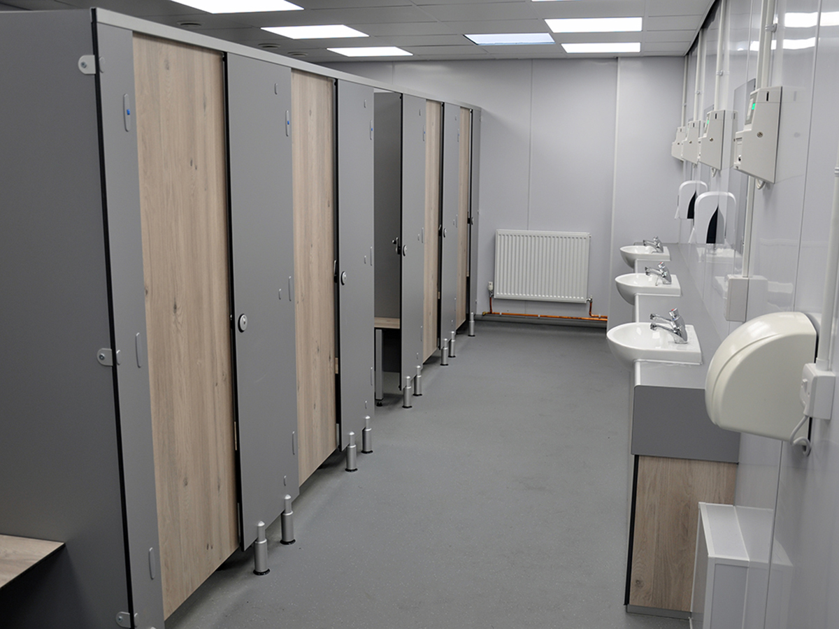 Shower Cubicles in a row Shower and toilet cubicles by Cubicle Centre